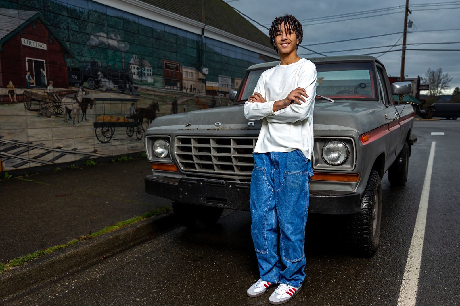 High school senior portrait with a classic Ford truck